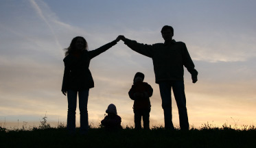 family walking on beach